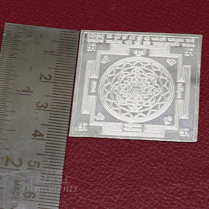 Handmade 4x4 cm sterling silver Shri Yantram for wealth and prosperity, a divine puja article by Tribal Ornaments.