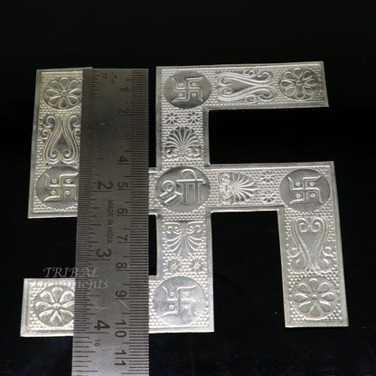 Handmade 4x4 inch 925 sterling silver swastika ornament from TRIBAL ORNAMENTS, perfect for home or temple decor.