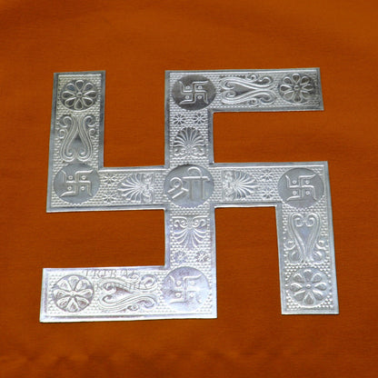 Handmade 4x4 inch 925 sterling silver swastika pendant, intricate tribal design for home or temple decoration.