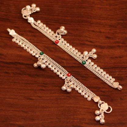 Sterling silver 5-inch baby ankle bracelet with bells and charm, handmade tribal jewelry, featuring a delicate chain and decorative bells.