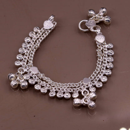 Handmade 5-inch sterling silver baby anklet with hanging noisy bells, unisex charm ankle bracelet by Tribal Ornaments.