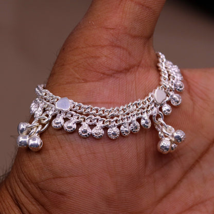 Handmade 5-inch sterling silver baby anklet with hanging noisy bells, unisex charm ankle bracelet by TRIBAL ORNAMENTS.