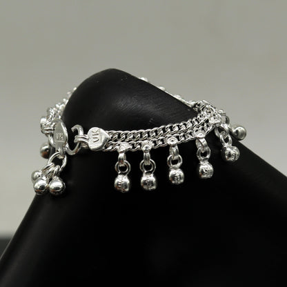 Handmade 5.2-inch sterling silver baby ankle bracelet with customized charm, unisex baby jewelry from TRIBAL ORNAMENTS.