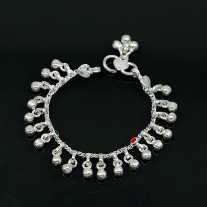 Handmade 5.5-inch sterling silver baby anklet with jingling bells and waved design, perfect for kids' jewelry and gift-giving.