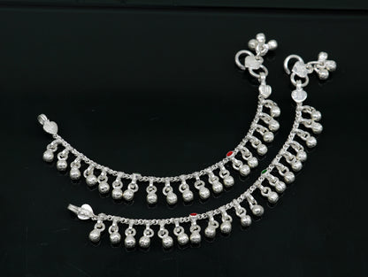 Handmade 5.5-inch sterling silver baby anklet with waved design and jingling bells, suitable for kids' jewelry and gift-giving.