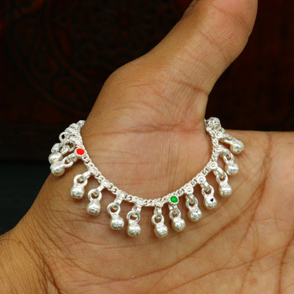 Handmade 5.5-inch sterling silver baby anklet with jingling bells and wave design by Tribal Ornaments, perfect for kids' jewelry.