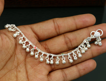 Handmade 5.5-inch sterling silver baby anklet with waved design and jingling bells from TRIBAL ORNAMENTS, perfect for kids' jewelry.