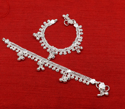 Handmade 5.5-inch sterling silver baby ankle bracelet with customizable charm, unisex design, and delicate foot bracelet style.