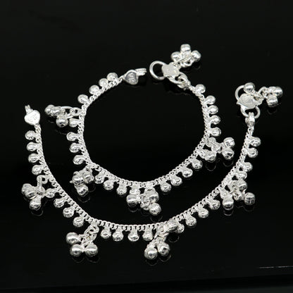 Handmade 5.5-inch sterling silver baby anklet with unisex design and customized charm, featuring intricate tribal ornament details.