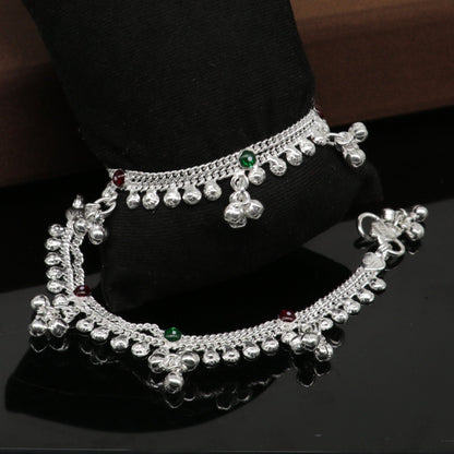 Sterling silver 5.5-inch baby anklet with handmade bells, charms, and intricate tribal design from Tribal Ornaments.