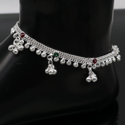 Sterling silver handmade baby ankle bracelet with customizable charm, unisex design, 5.5 inches, tribal-inspired jewelry.
