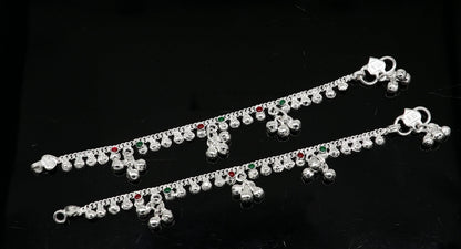 Handmade sterling silver baby ankle bracelet with dainty charm, 5.5 inches long, unisex and customizable by Tribal Ornaments.