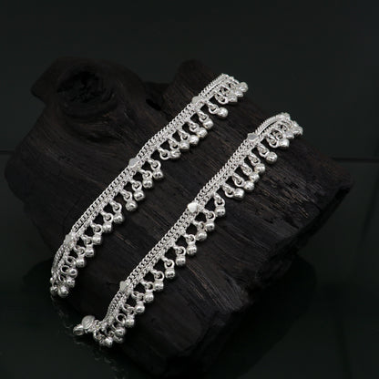 Sterling silver handmade ankle bracelet with bells and charm, 5.5 inches, featuring a delicate chain and decorative foot jewelry.