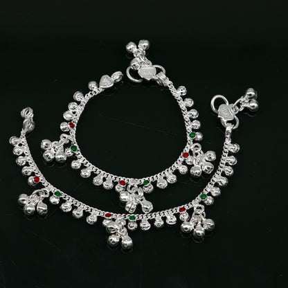 Handmade sterling silver vintage-style baby ankle bracelet with noisy sound bells and charm, featuring a 5.5-inch length.