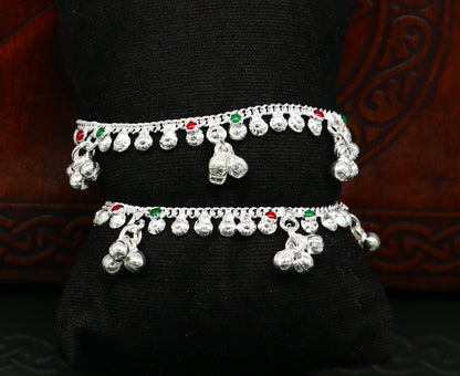 Handmade sterling silver vintage-style baby ankle bracelet with noisy bell charms, featuring a 5.5-inch length and intricate design.