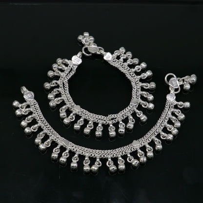 Sterling silver handmade baby anklet with jingling bells, tribal-style kids jewelry from India, designed for delicate ankle wear.