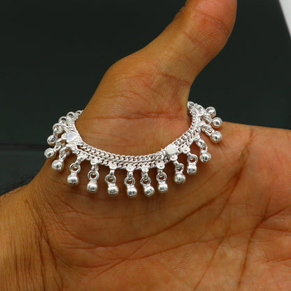 Sterling silver handmade jingling anklet for babies, tribal ornaments brand, with small bells and intricate design, suitable for kids' jewelry.