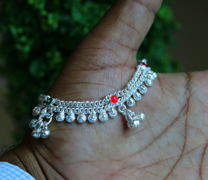 Sterling silver handmade baby and kids ankle bracelet with noisy sound bells and customized charms by TRIBAL ORNAMENTS.