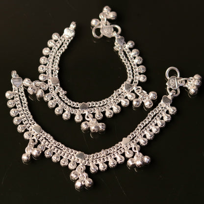 Handmade sterling silver baby anklet with hanging noisy bells and charm, unisex baby foot bracelet by TRIBAL ORNAMENTS.