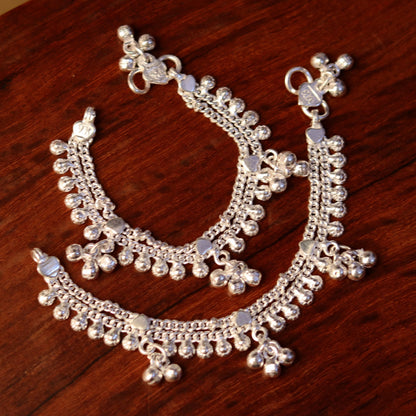 Sterling silver baby anklet with hanging noisy bells and charm, unisex design, handcrafted by TRIBAL ORNAMENTS.