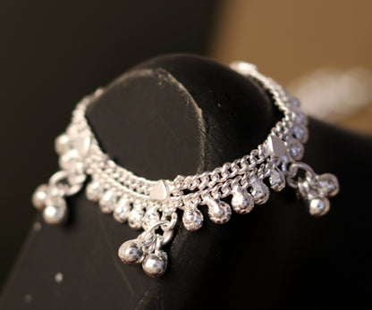 Sterling silver baby anklet with hanging noisy bells and charm, unisex design, handcrafted by Tribal Ornaments.