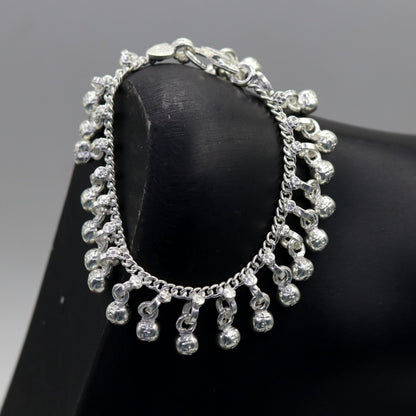 Sterling silver handmade baby ankle bracelet with noisy sound charm, from Rajasthan India, by Tribal Ornaments.