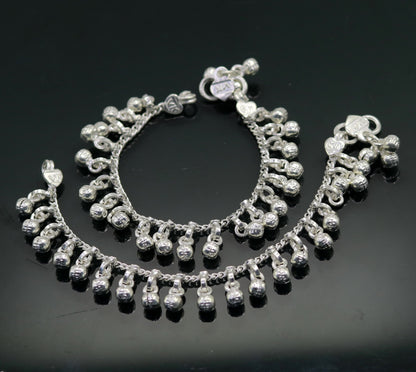 Sterling silver handmade ankle bracelet with noisy sound charm, tribal jewelry from Rajasthan India, suitable for babies or children.