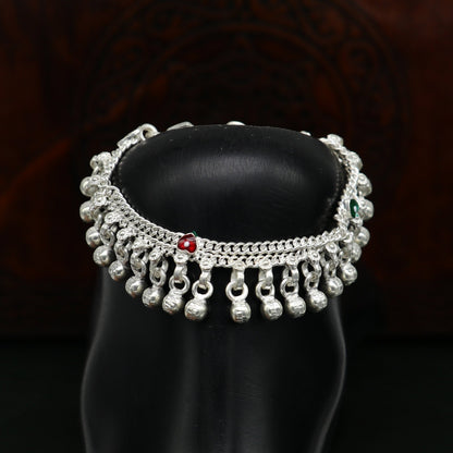 Handmade 5-inch sterling silver ankle bracelet with jingling waved bells, perfect for kids or baby foot jewelry by TRIBAL ORNAMENTS.