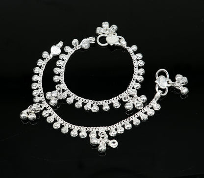 Handmade sterling silver baby ankle bracelet with delicate charm, 5 inches long, unisex design, tribal ornaments brand.