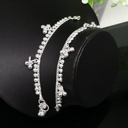 Sterling silver handmade baby ankle bracelet with dainty charm, 5 inches long, unisex, elegant and customizable baby jewelry.