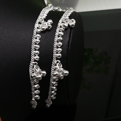 Handmade 5-inch sterling silver baby ankle bracelet with delicate charm, designed for kids and unisex, elegant and customizable.