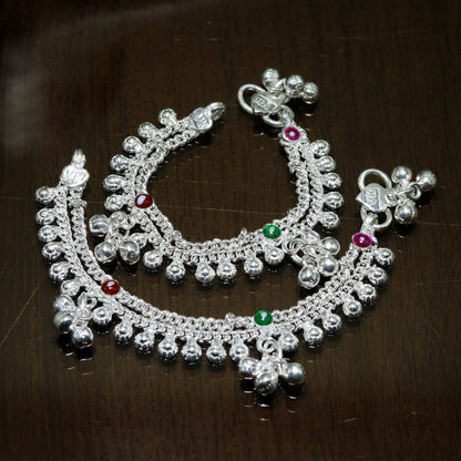 Sterling silver double chain ankle bracelet with jingling bells for newborn babies, featuring charming bells and delicate jewelry design.