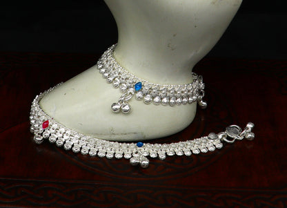 Sterling silver handmade baby ankle bracelet with jingling charm, 5-inch length, tribal-inspired jewelry for newborns.