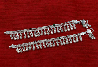 Sterling silver baby anklet with 5-inch length, hanging waved bells, and charming jingling noise, designed as kids jewelry.