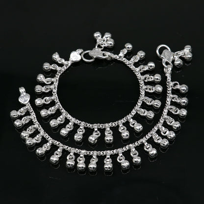 Vintage sterling silver baby anklet with waved hanging bells, handmade tribal design, perfect as an ankle or charm bracelet.
