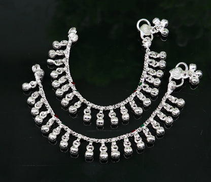 Sterling silver handmade baby ankle bracelet with waved jingling bells, tribal ornaments, and intricate design for kids' jewelry.