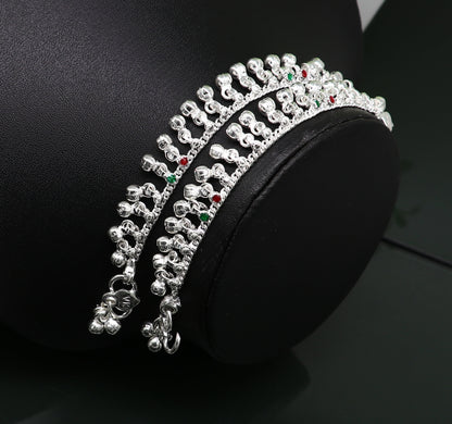 Sterling silver handmade baby ankle bracelet with waved jingling bells and noisy bells, suitable for kids' jewelry and gifting.