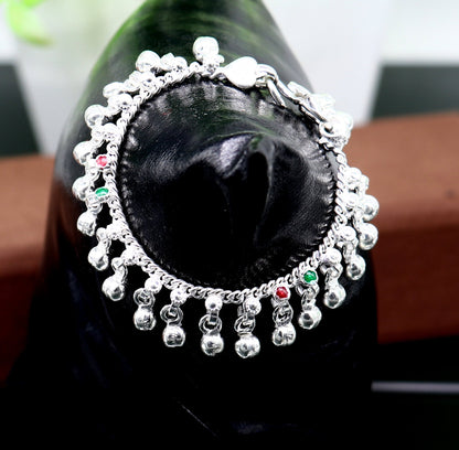 Sterling silver handmade baby ankle bracelet with waving jingling bells, tribal design, perfect for kids' jewelry and gifting.