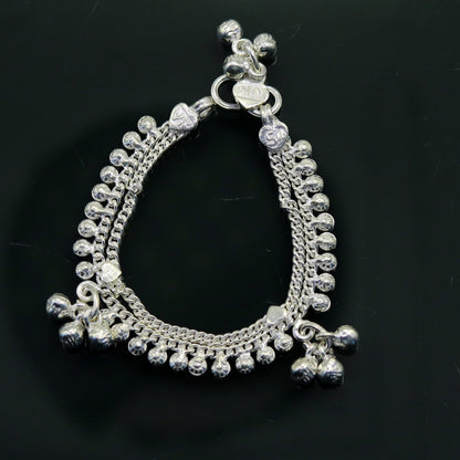 Sterling silver handmade baby ankle bracelet with charm, designed for newborns, from TRIBAL ORNAMENTS.