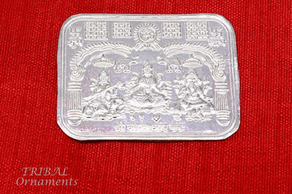 Handmade 925 sterling silver Shree Lakshmi Ganesha and Saraswati divine frame for wealth and prosperity, crafted by Tribal Ornaments.