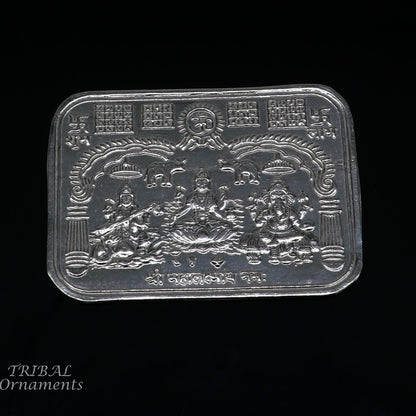 Handmade 5x4 cm sterling silver Shree Lakshmi, Ganesha, and Saraswati divine frame by Tribal Ornaments for wealth and prosperity.