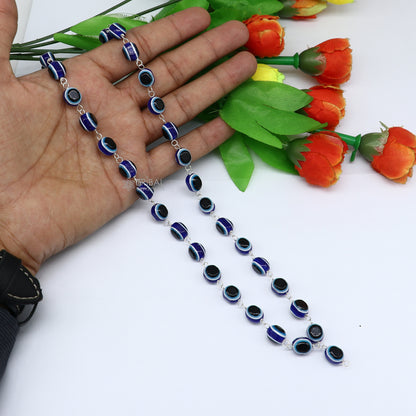 Handmade 54-bead Jaap mala necklace with evil eye beads and 925 silver chain for meditation, by Tribal Ornaments.