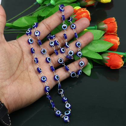 Handmade 54-bead Jaap mala necklace with evil eye beads and 925 silver chain, ideal for meditation and spiritual wear.
