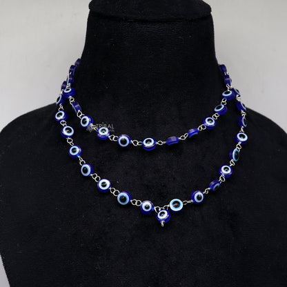 Handmade 54-bead Jaap mala with evil eye beads on a 925 silver chain, used as a meditation necklace by Tribal Ornaments.