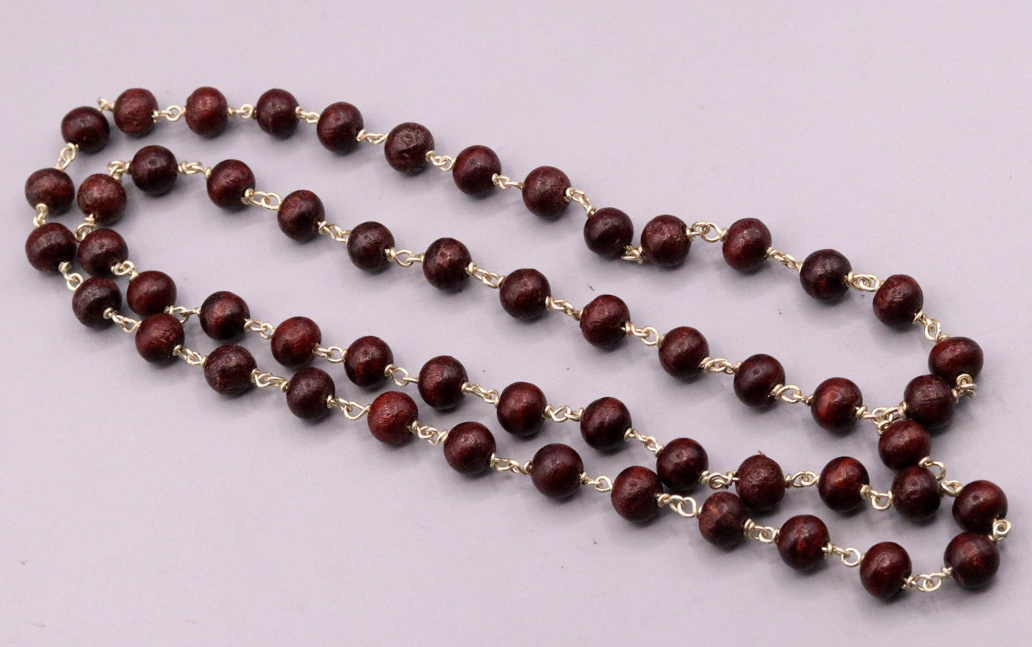Red sandal chandan jaap mala with 54 beads on a 925 sterling silver chain, tribal regional jewelry from India.