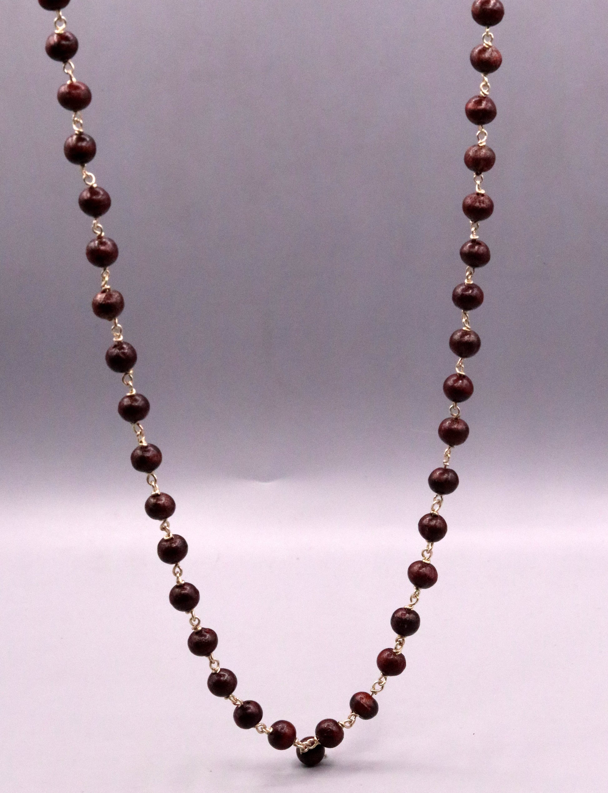 Red sandal chandan jaap mala with 54 beads on a 925 sterling silver chain, traditional tribal jewelry from India.