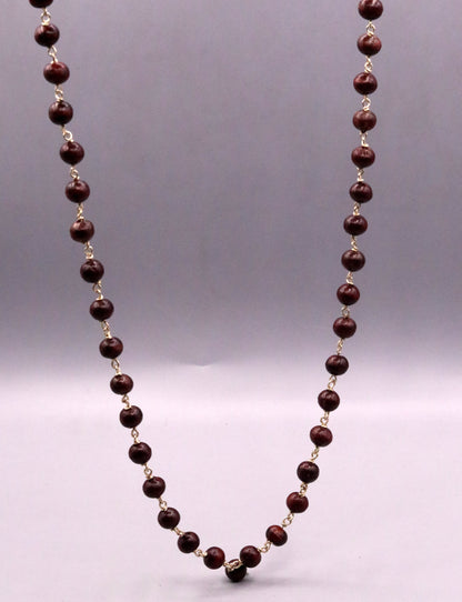 Red sandal chandan jaap mala with 54 beads on a 925 sterling silver chain, traditional tribal jewelry from India.