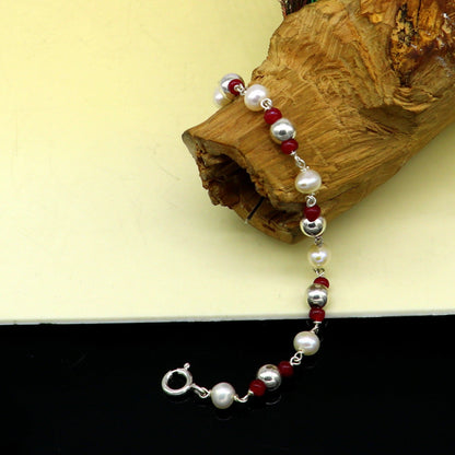 Sterling silver and pearl beaded baby bracelet with custom design, handmade baby jewelry for newborns by TRIBAL ORNAMENTS.