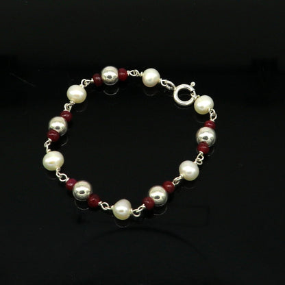 Sterling silver and pearl beaded baby bracelet with customizable design, handmade baby jewelry for newborns by TRIBAL ORNAMENTS.
