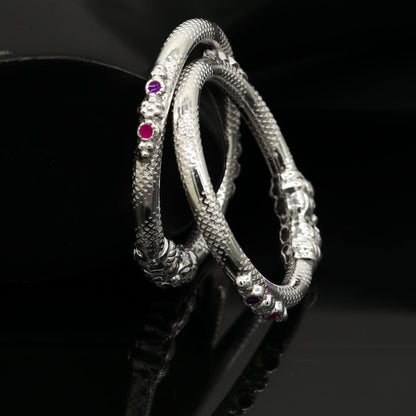 Sterling silver baby bangle bracelet with a customized elephant face design, perfect for kids, by TRIBAL ORNAMENTS.